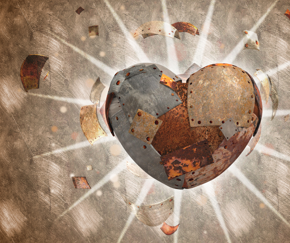 Grafika serce na tle słońca.